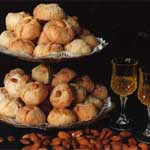 italian amaretti cookies with glass of strega