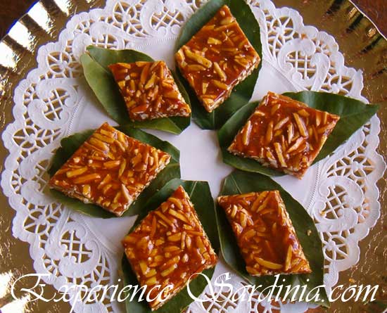 sardinian almond brittle cookies served on fresh lemon leaves