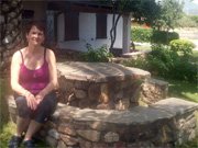 stone table and seating in the grounds at the villa